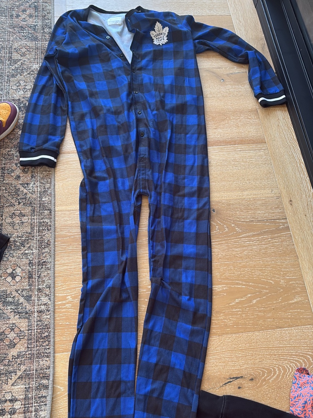 Men’s size small onesie Black Plaid One-Piece Pajamas with Maple Leaf Patch